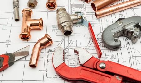 plumbing supplies with blueprints