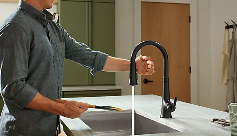 Man using touchless faucet | Kitchen Renovation | Weinstein Bath & Kitchen